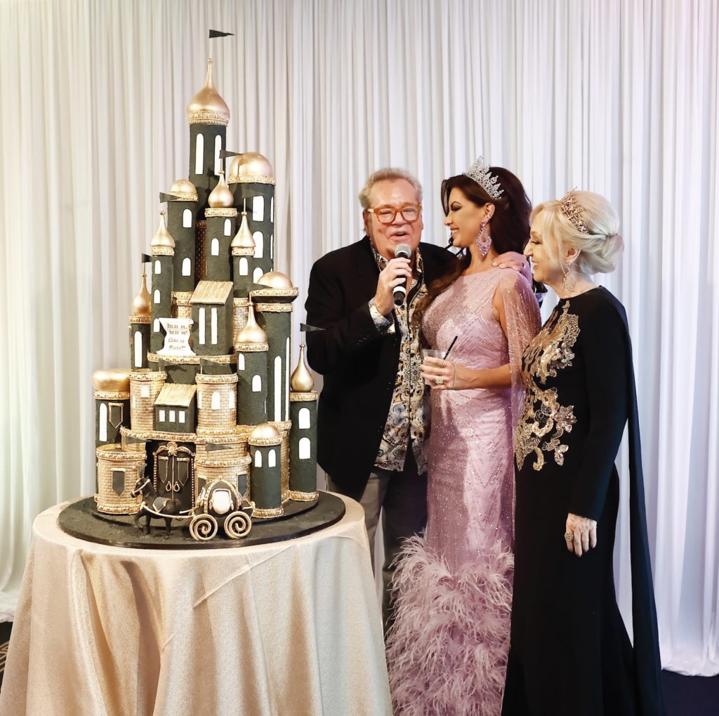Bubba McNeely sings 'Happy Birthday' to Nicole Lassiter with her mother Denise O'Brian at the fantasy party Hotel ZaZa. (Photo by Quy Tran)