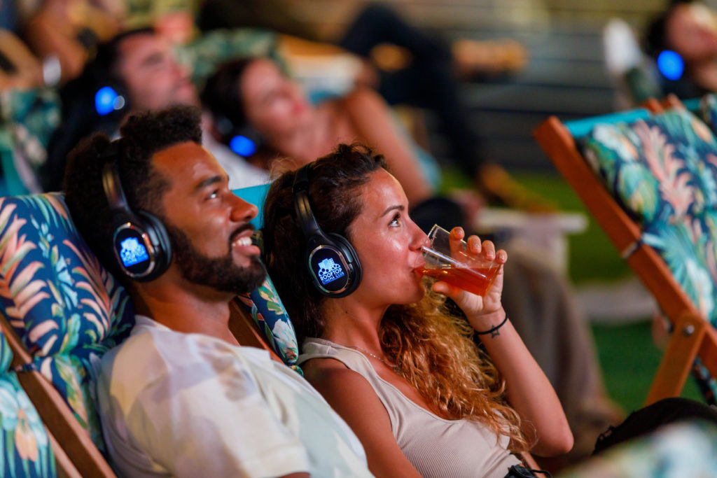 Rooftop Cinema Club comes with your own lounge chair and personal headset.