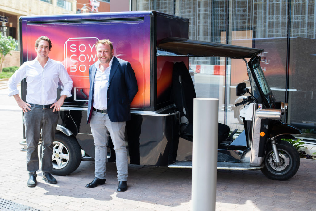 Loews Hotel president Alex Tisch and Ben Berg are excited about the new Soy Cowboy restaurant.