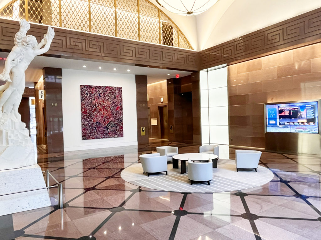 New art by Saif Azzuz, juxtaposed with art from The Crescent's original collection - statue Apollo and Daphne by Paolo Borghi.