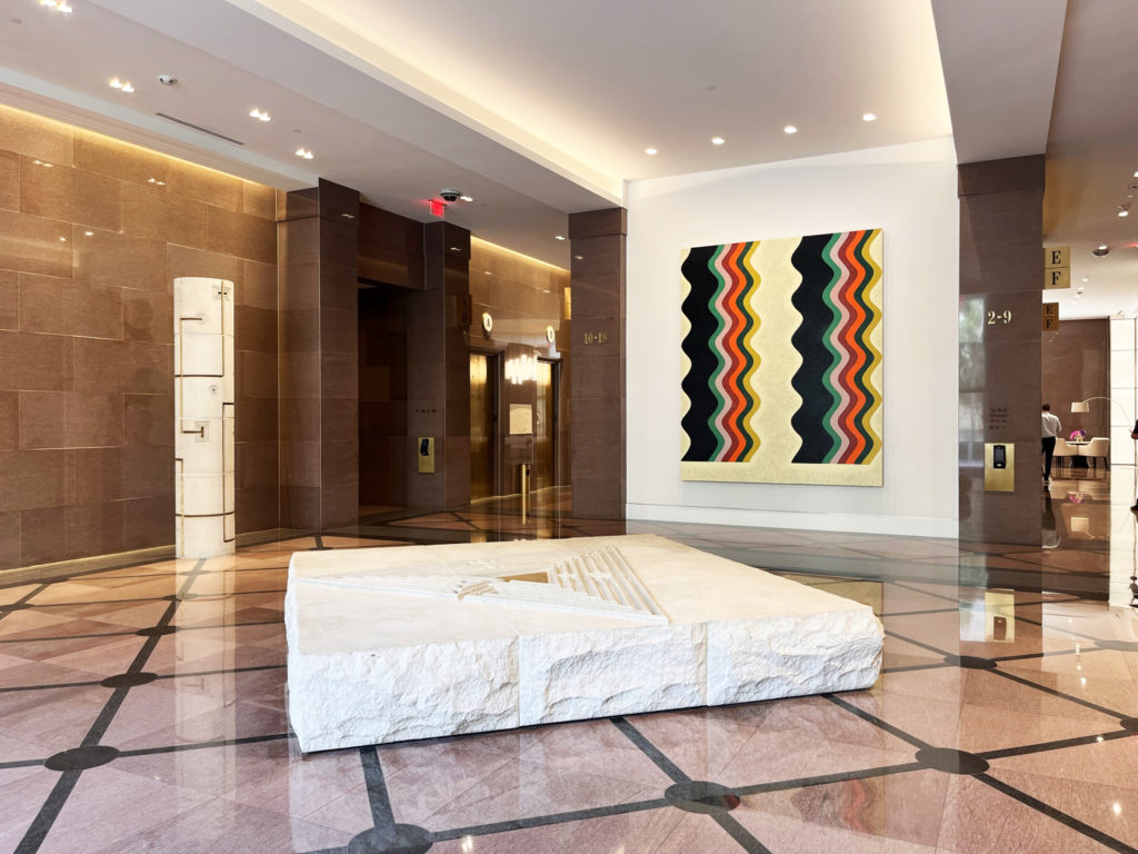 Newly acquired art by Matt Kleberg, shown next to the original collection's concrete art by Brad Goldberg.