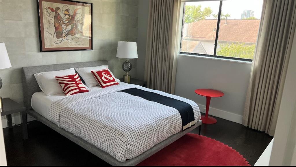 Secondary bedroom in the townhouse at 1922 Fairview. (Photo by Anthony Rathbun)