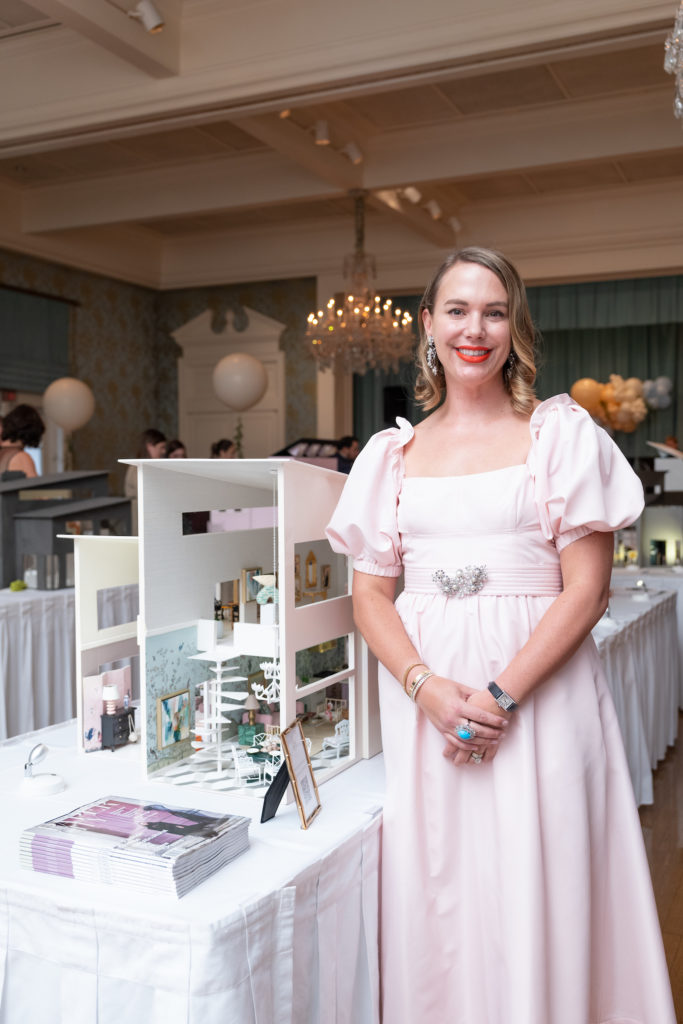 Interior designer Hallie Henley with her dollhouse at the "La Petite Maison" gala (Photo by Daniel Ortiz)