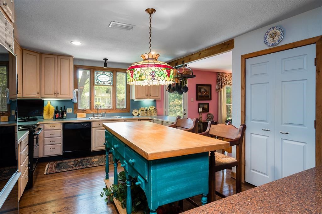 The kitchen flows right into a gracious dining room.