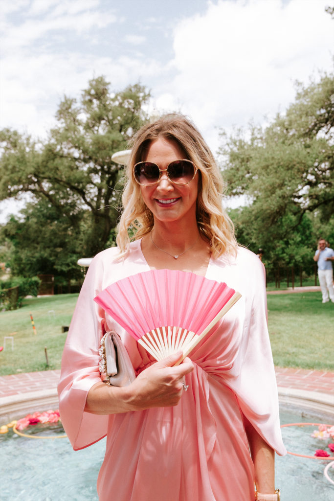 Guests at the fashionable poolside lunch at The Commodore Perry Estate. (Photo by Kristen Kilpatrick)