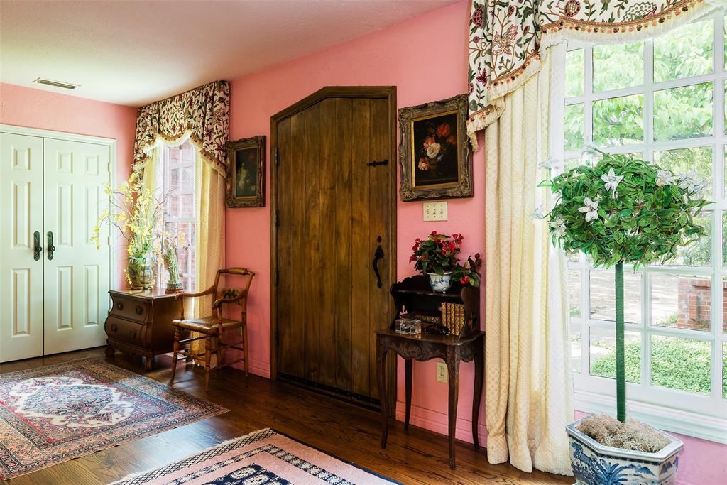 A pop of pink welcomes you in. 