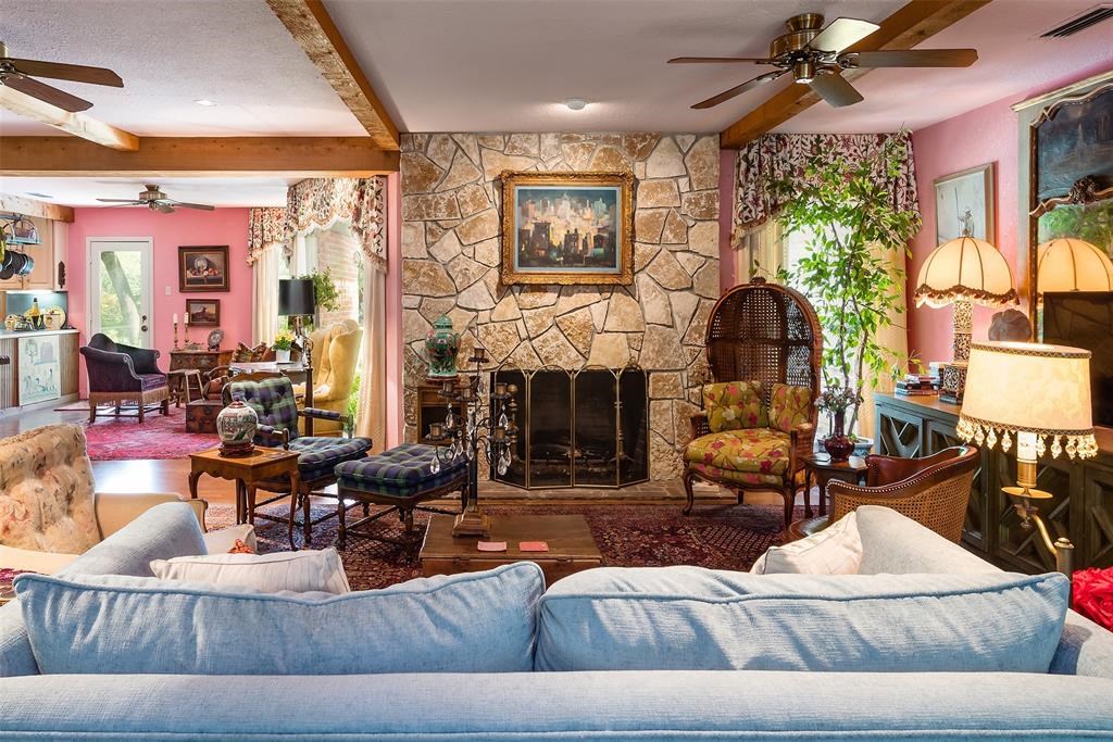 A stone-face fireplace brings instant warmth in the 1948 home. 