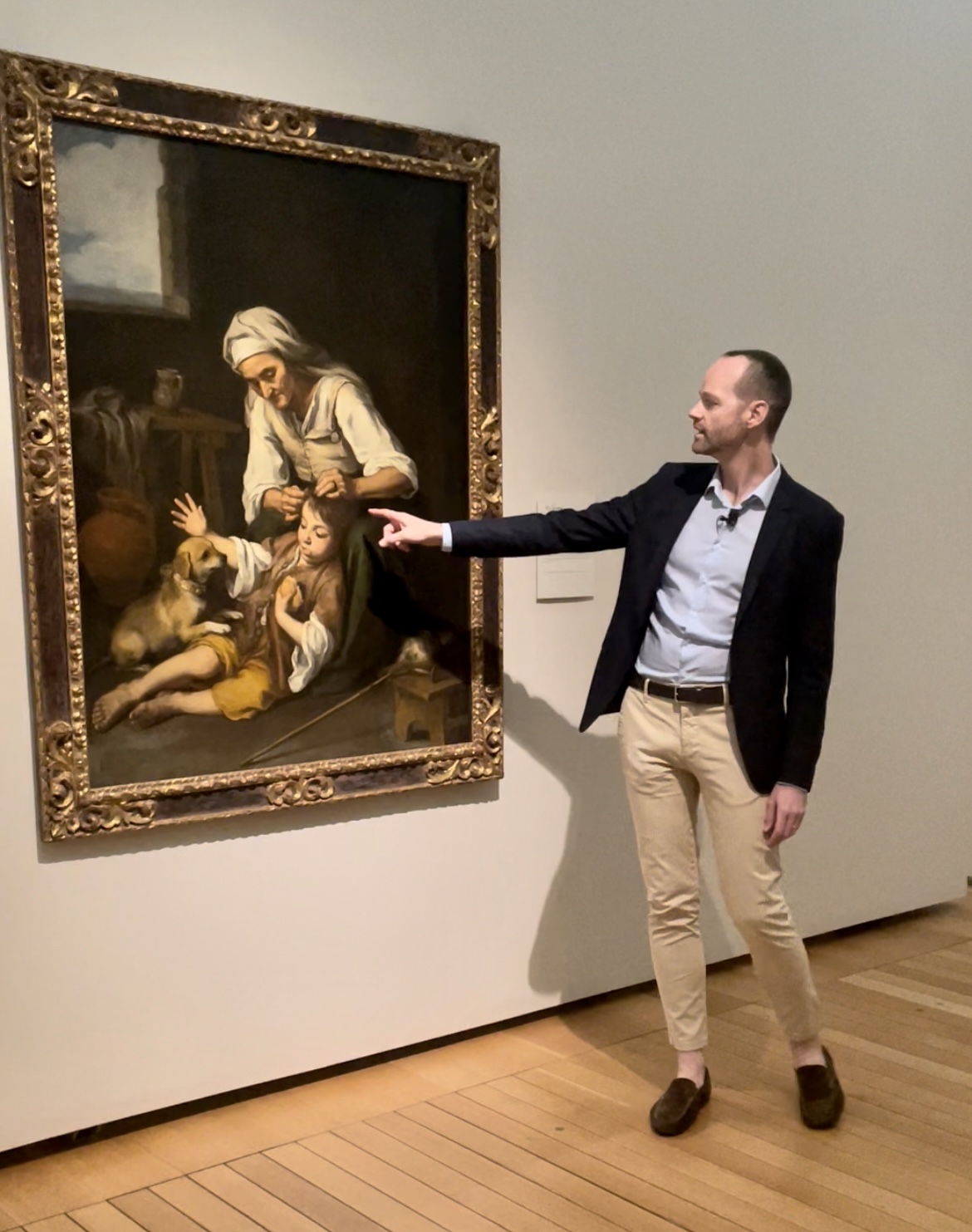 Curator Guillaume Kientz discusses the artworks in the new Murillo exhibit. (Photo by Courtney Dabney)