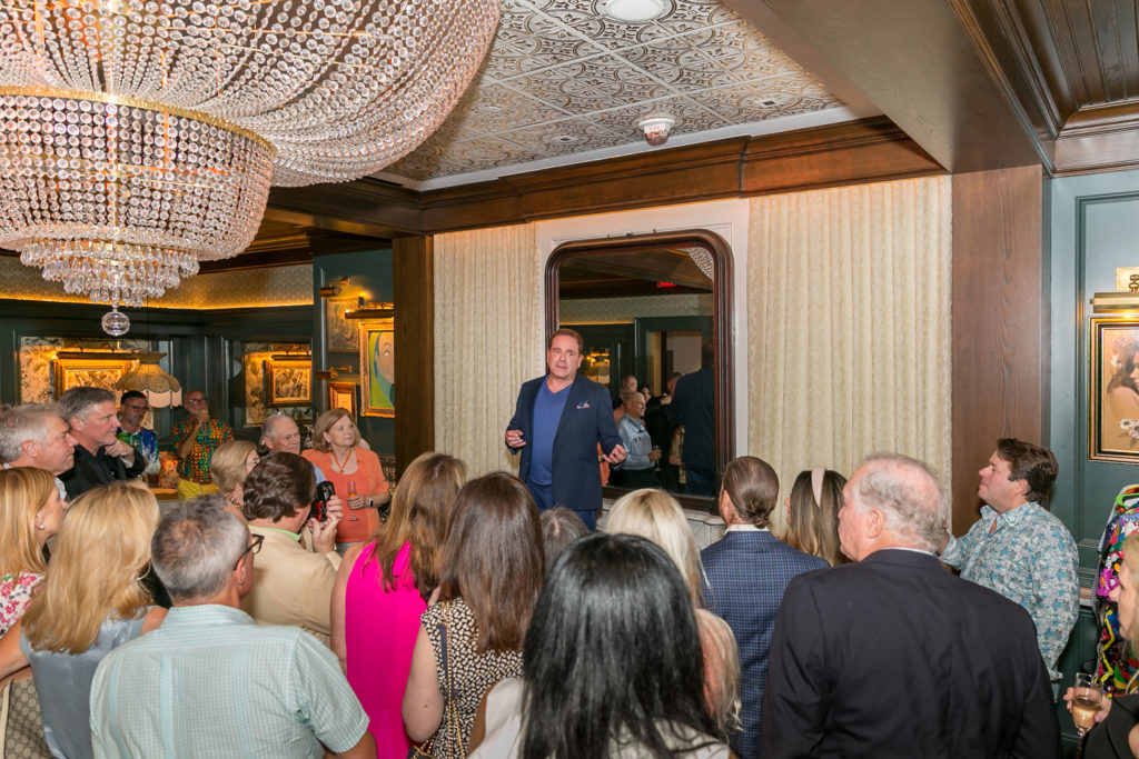 Gala co-chair Don Mafrige Jr. reveals RePsychedelic details to the rapt crowd at Orange Show Gala kickoff. (Photo by Emily Jaschke)