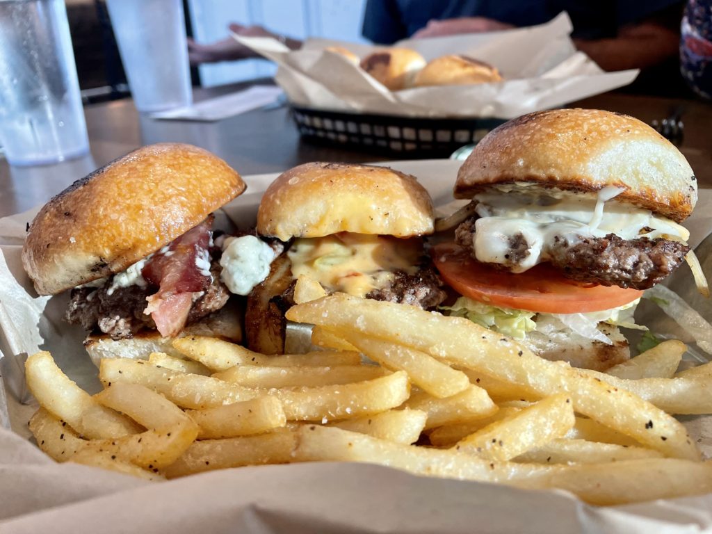 JD's Hamburgers - Slider sampler for media night served on sweet sourgdough buns. Photo by Courtney Dabney.