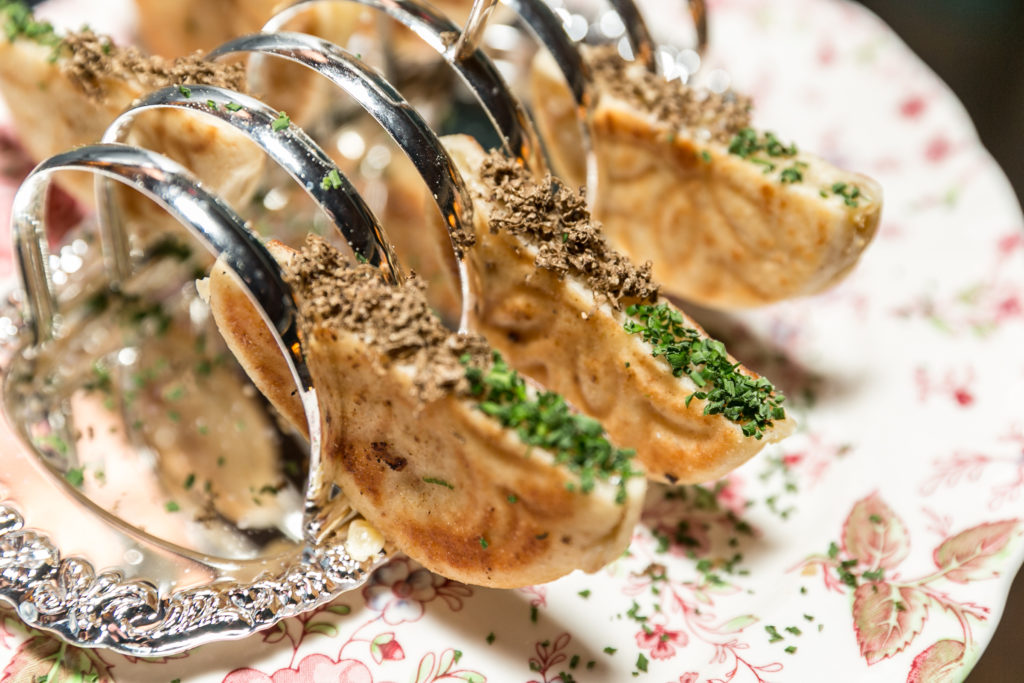 Kickoff fare courtesy C. Baldwin Hotel's Rosalie Italian Soul: Truffle Taleggio Crescentine at Orange Show Gala kickoff. (Photo by Emily Jaschke)