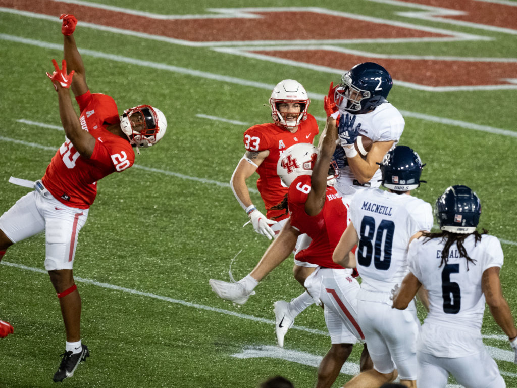 Rice's Hail Mary was answered when Bradley Rozner somehow came down with a 51-yard pass and one second was put back on the clock.  (Photo by F. Carter Smith)