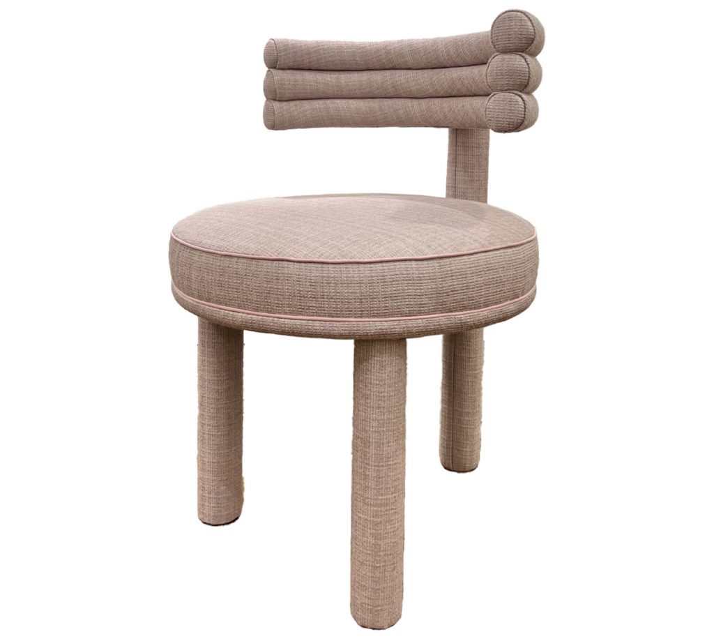 A contemporary chair created by Nina Magon for her Bergdorf Goodman home collection.