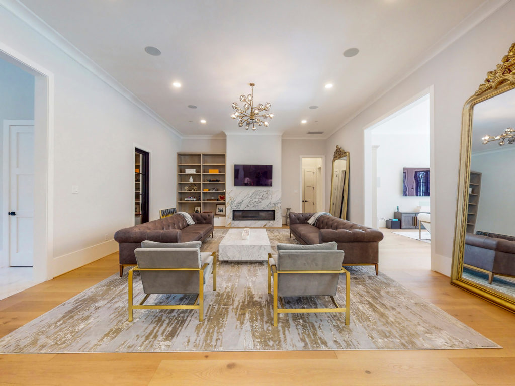 Multiple living/entertaining spaces ar keynote in the home at 346 Hunters Trail in Houston. (Photo by Jason Koonce with Hommati)