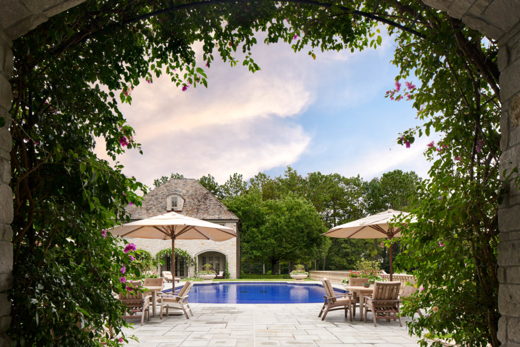 The swimming pool at 120 Carnarvon is tiled in sapphire blue.  (Photo by Nathan Schroder/Douglas Elliman)