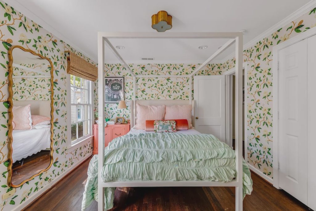 A magnolia print from Thibaut papers the master bedroom. 