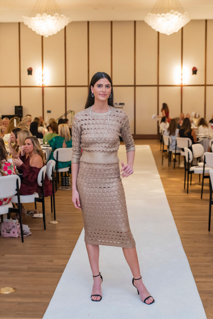 A runway model wearing St. John. (Photo by Tamytha Cameron Photography)