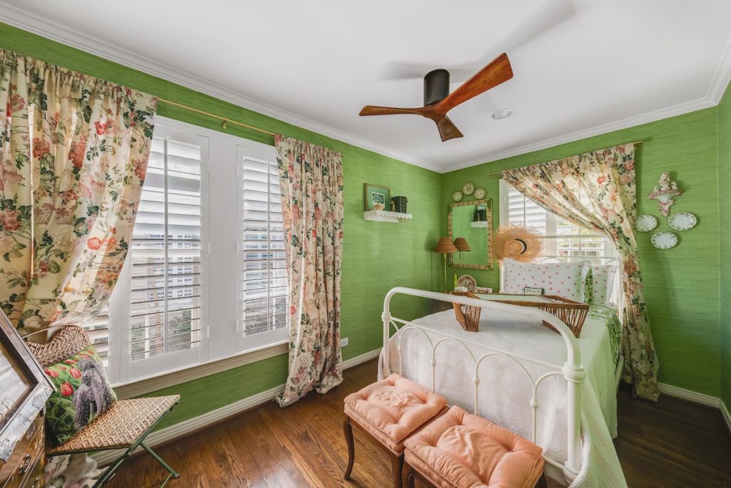A mix of vintage and estate sale finds add personality to a second bedroom. 