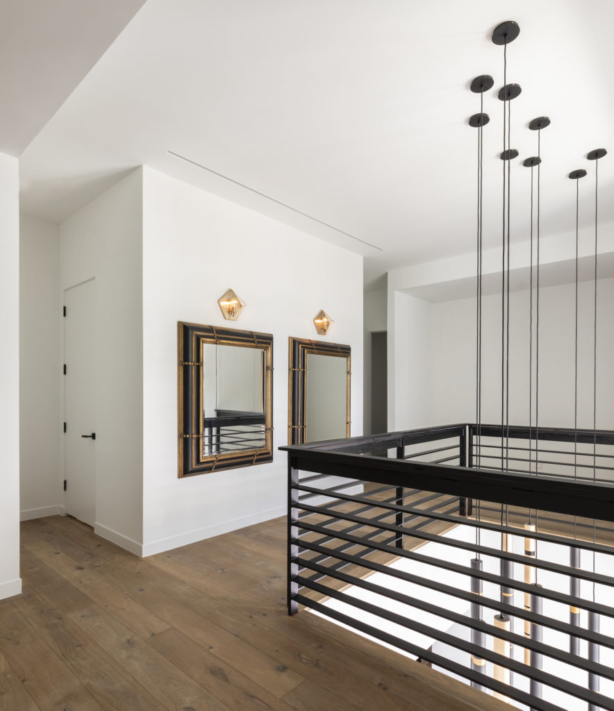 The second floor stairwell at 4006 Essex, The House of Many Palms.(Julie Soefer Photography)