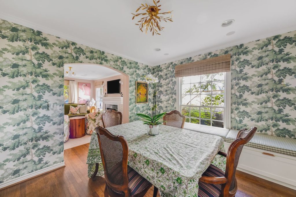 Scalamandré "Raphael" wallpaper lines the dining area. 