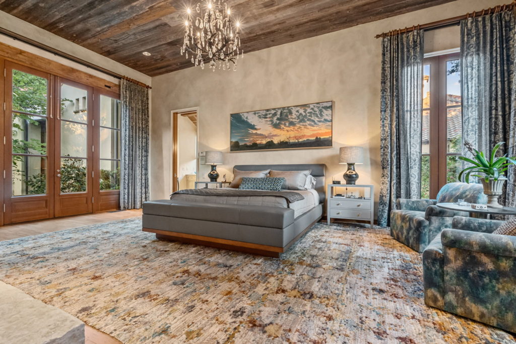 The oversized primary bedroom at 6701 Laurel Valley is a warm and homey space.