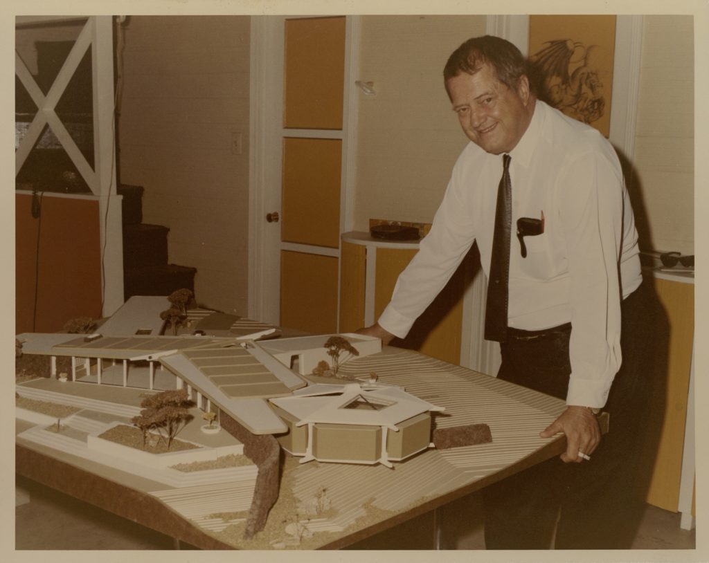 Architect William F. Cody, circa 1964, with his unbuilt model for the Robert P. McCulloch House, Lake Havasu City, Arizona  (Courtesy the William F. Cody Papers and William F. Cody Papers 2, Special Collections and Archives, Robert E. Kennedy Library, California Polytechnic State University, San Luis Obispo)