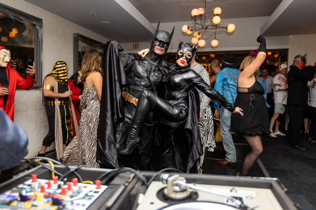 Costume winners Malcolm McCourt & Christa Elyce as Bat Man and Cat Woman at the Brasserie 19 Halloween bash (Photo by Andrew Hemingway)