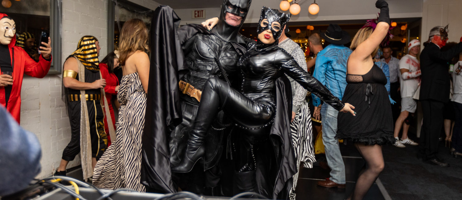 Costume winners Malcolm McCourt & Christa Elyce as Bat Man and Cat Woman at the Brasserie 19 Halloween bash (Photo by Andrew Hemingway)