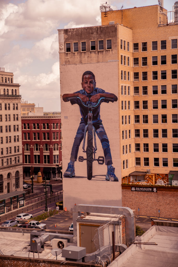 Case MaClaim's completed mural, "Social Equity."  (Photo by @superkant and @cyvisuals_, courtesy Street Art for Mankind)