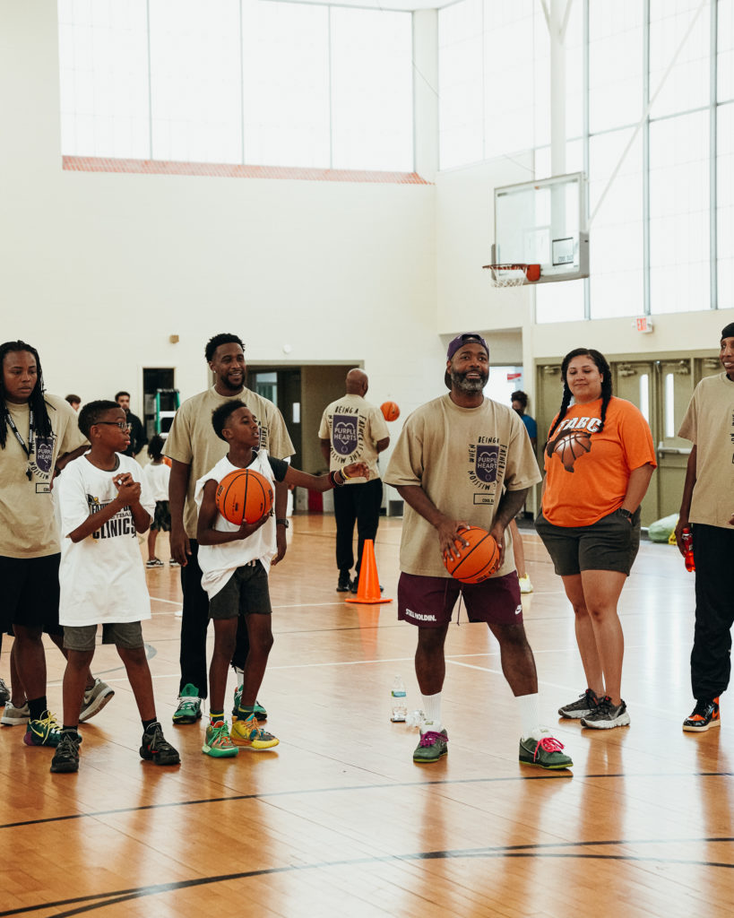 Fathers enjoy playing basketball with their children at CoolxDad's Father + Child Clinic. (Courtesy Kevin Barnett)