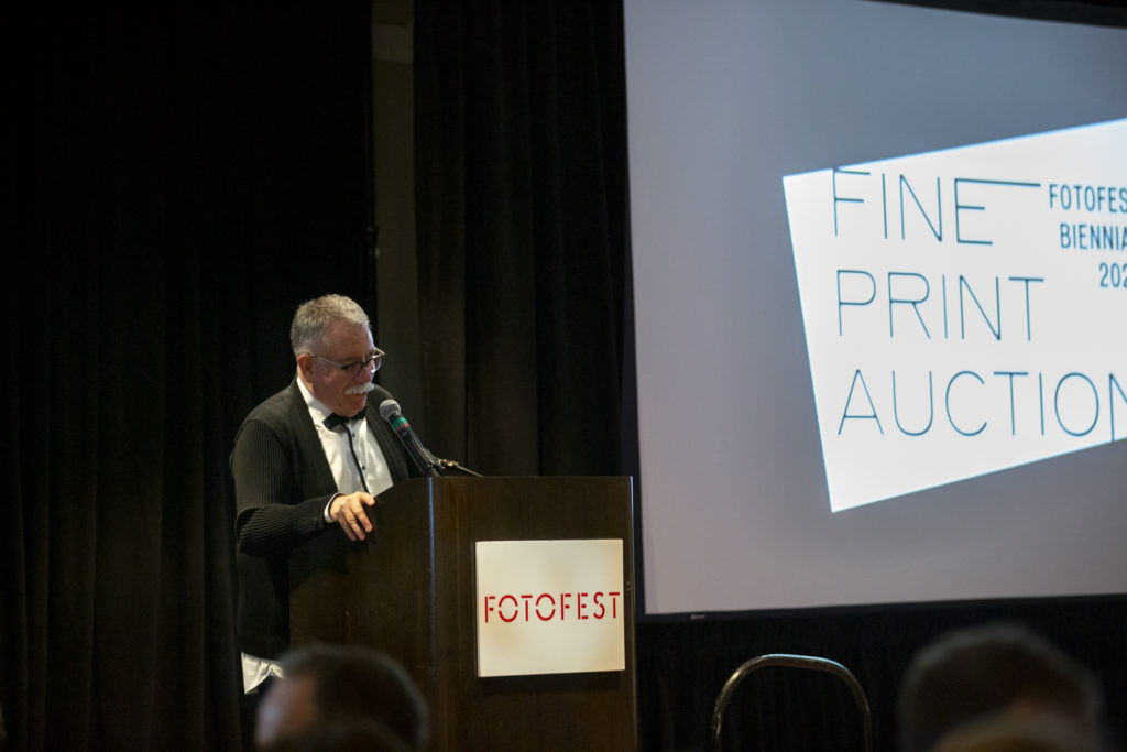 FotoFest director Steven Evans delivered opening remarks at the FotoFest Fine Print Auction. (Photo by Tere Garcia)