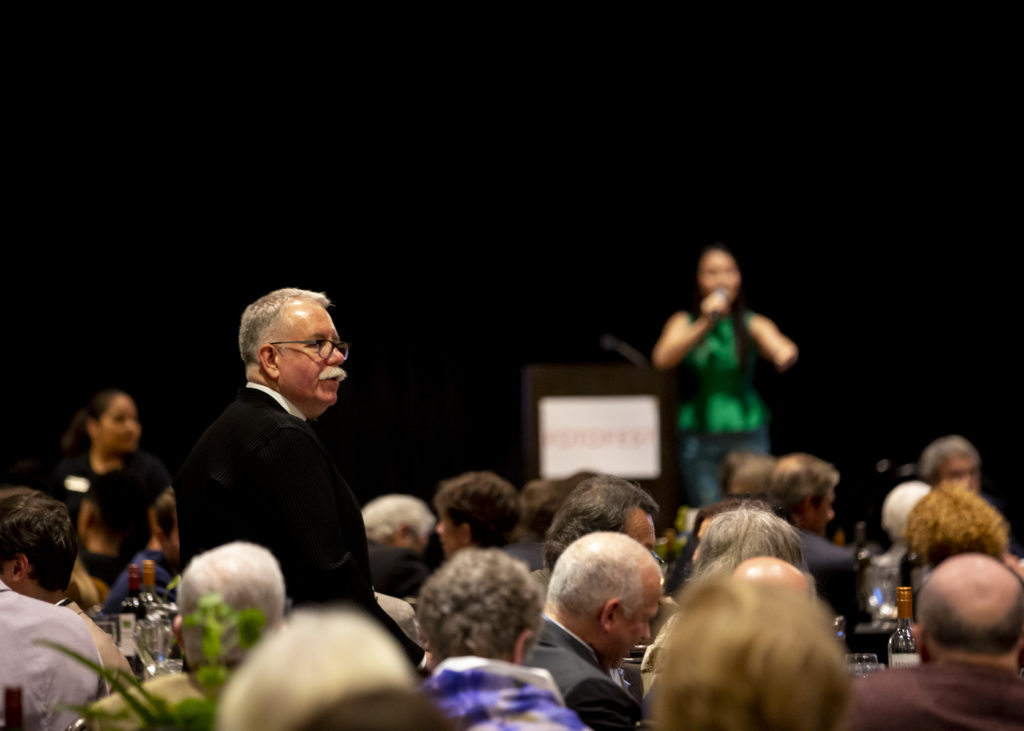 FotoFest director Steven Evans surveys the action at the FotoFest Fine Print Auction. (Photo by Tere Garcia)
