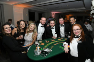 Casino games contributing to the fundraising at the Children's Museum Houston Viva Las Vegas gala. (Photo by Alexander's Fine Portrait Design)