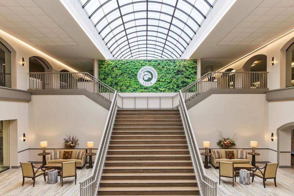 The updated Houstonian Club features an atrium area that once concealed the skylight above. Now revealed, the window bathes the space with sunlight. (Photo by Courtesy of The Houstonian Hotel, Club and Spa)