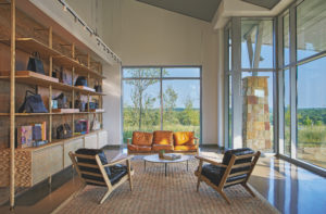 The guest entry lounge at Louis Vuitton’s Rochambeau Ranch features LV classic bags. (Photo by Jason Schmid)