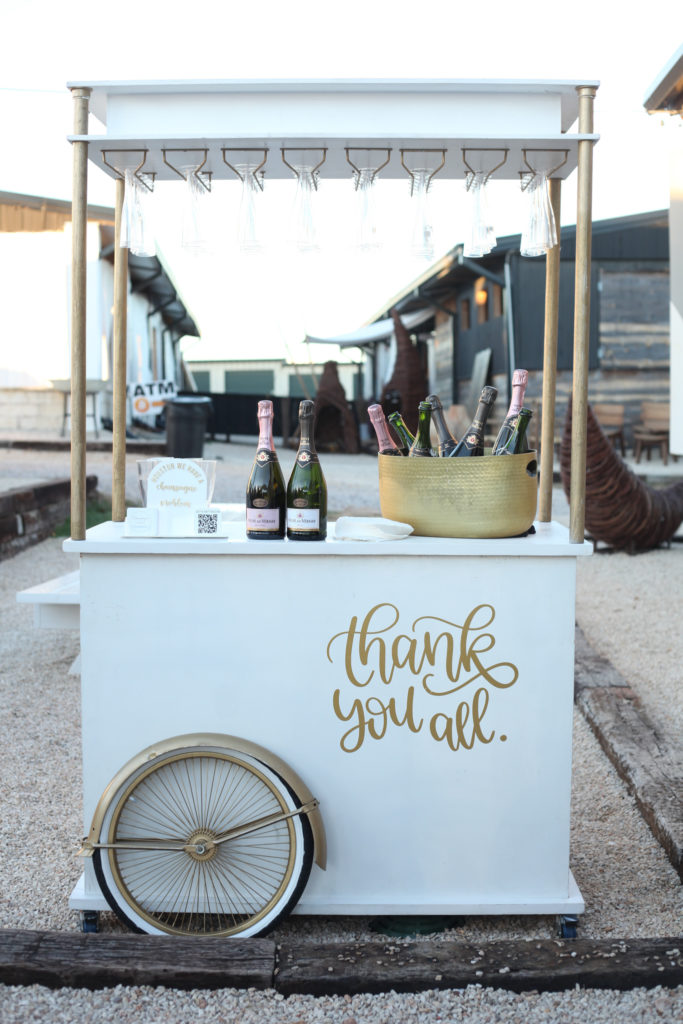 Champagne Problems fueled the cocktail cart at Disco Cowboy Thank You party.  (Photo by Chris Pierre Bachman)