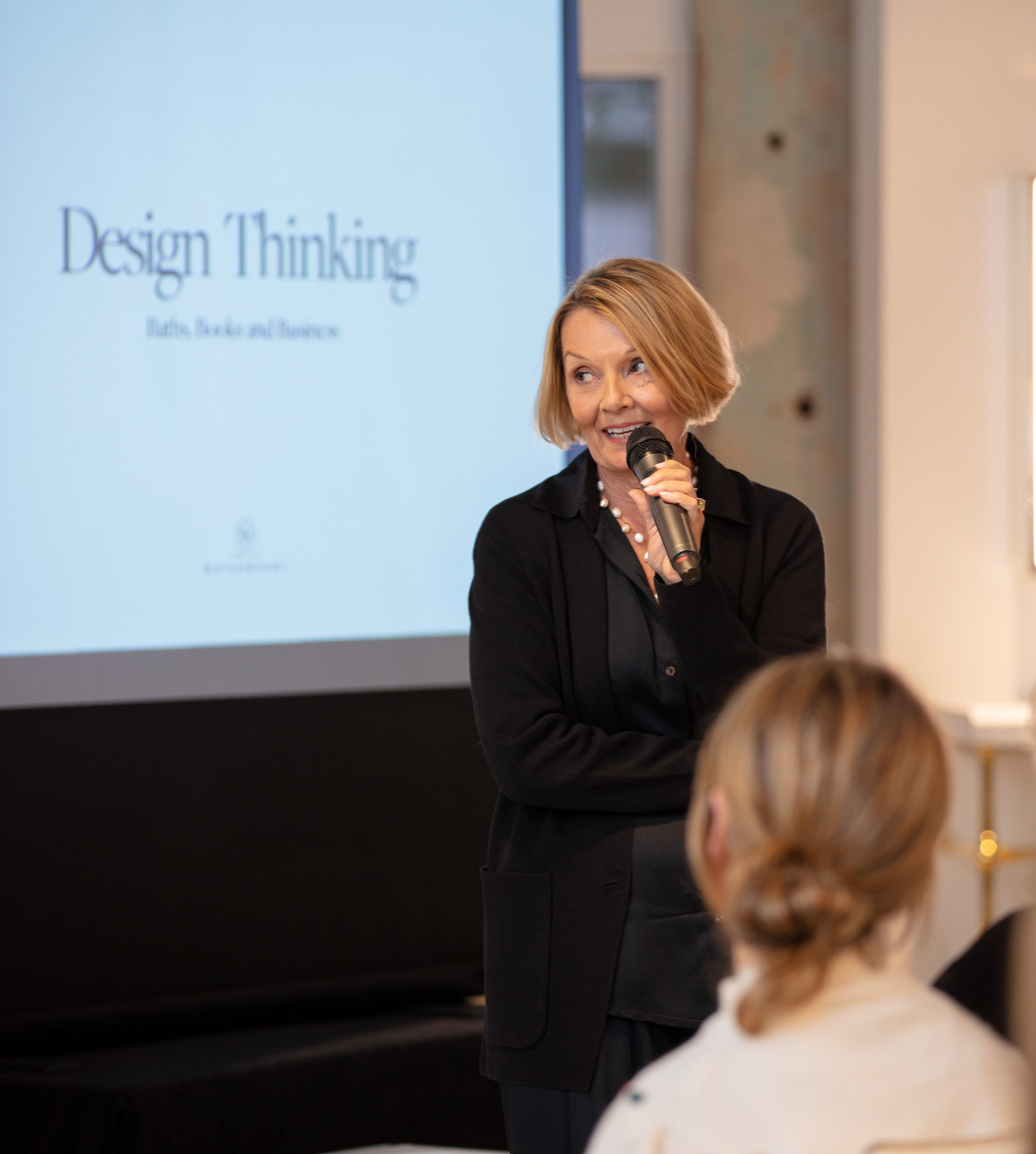 Elegant Additions owner Julie Koch hosted Barbara Sallick's talk, "Design Thinking," featuring a book signing for <em>The Ultimate Bath</em>. (Photo by Miroma Photography)