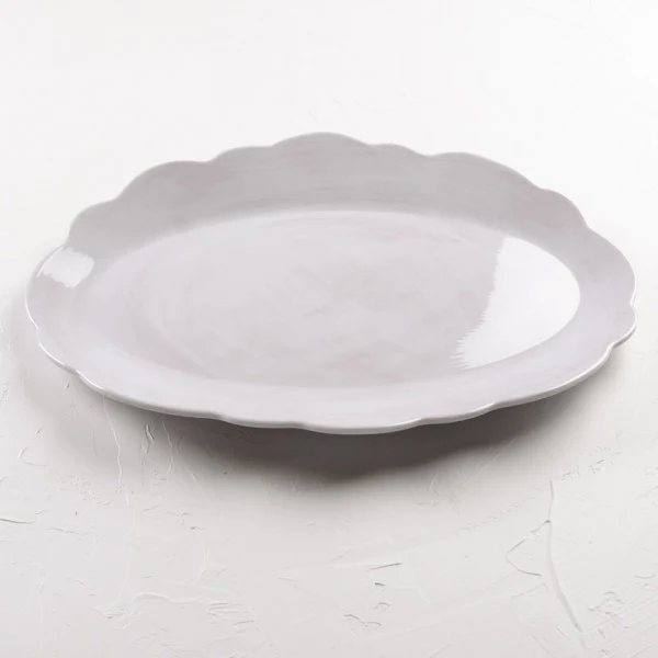 Biscuit Scalloped Serving Plate. (Photo: Biscuit)