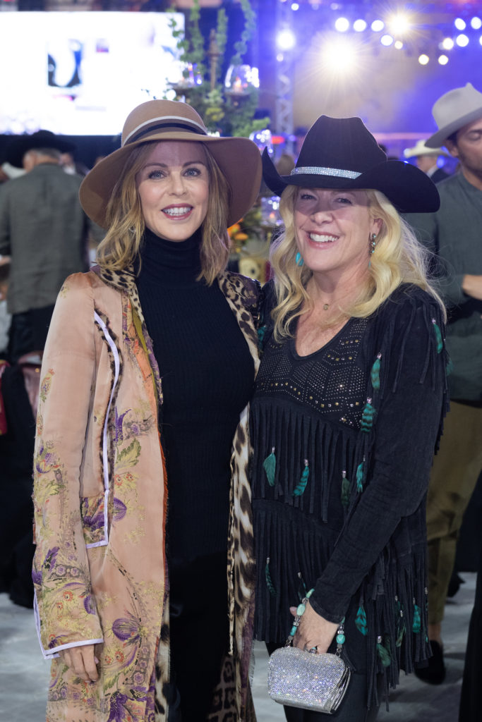 Elizabeth Petersen, Kara Vidal at the Shriners Children’s Celebration of the Century on the field at Minute Maid Park. (Photo by Wilson Parish)