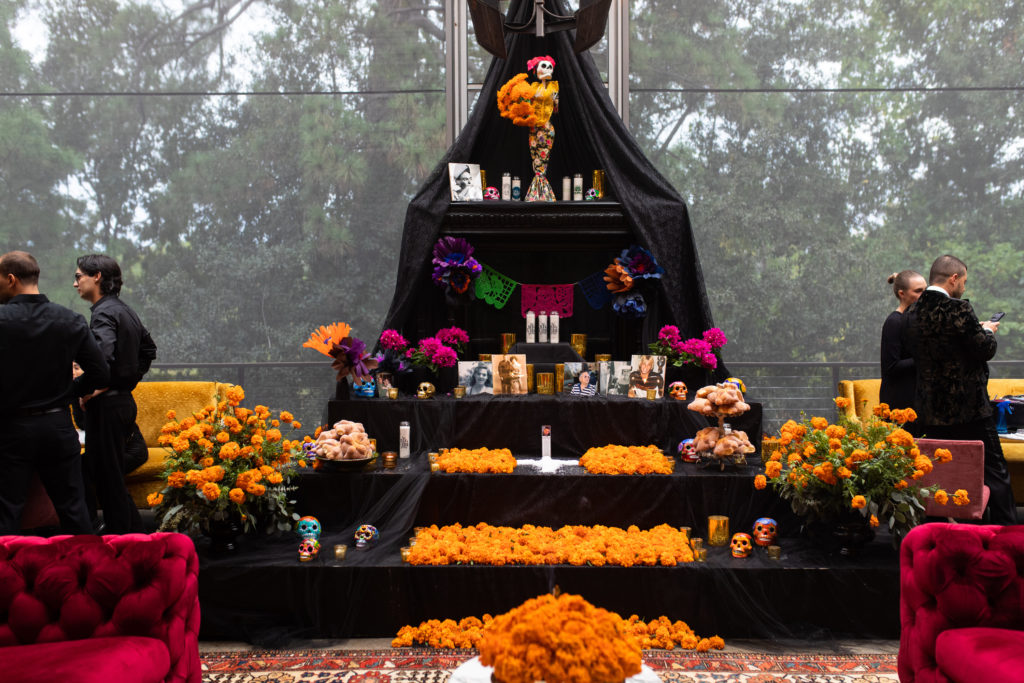 The ofrenda, created for Flora's Cena Negra, is awash in traditional offerings including banks of marigolds. (Photo by Leah Walker Wilson)