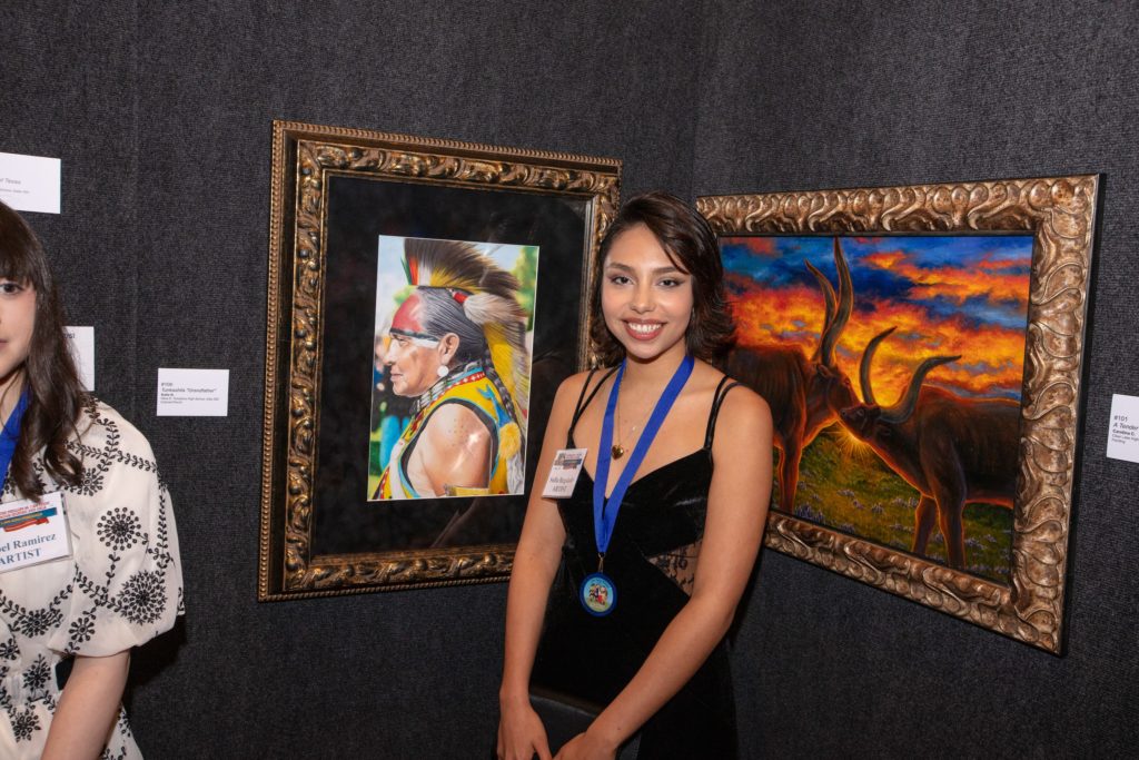Featured student artist Sofia Regalado at the Phillips 66 'I Am Texas' book signing celebration. (Photo by Dave Rossman)