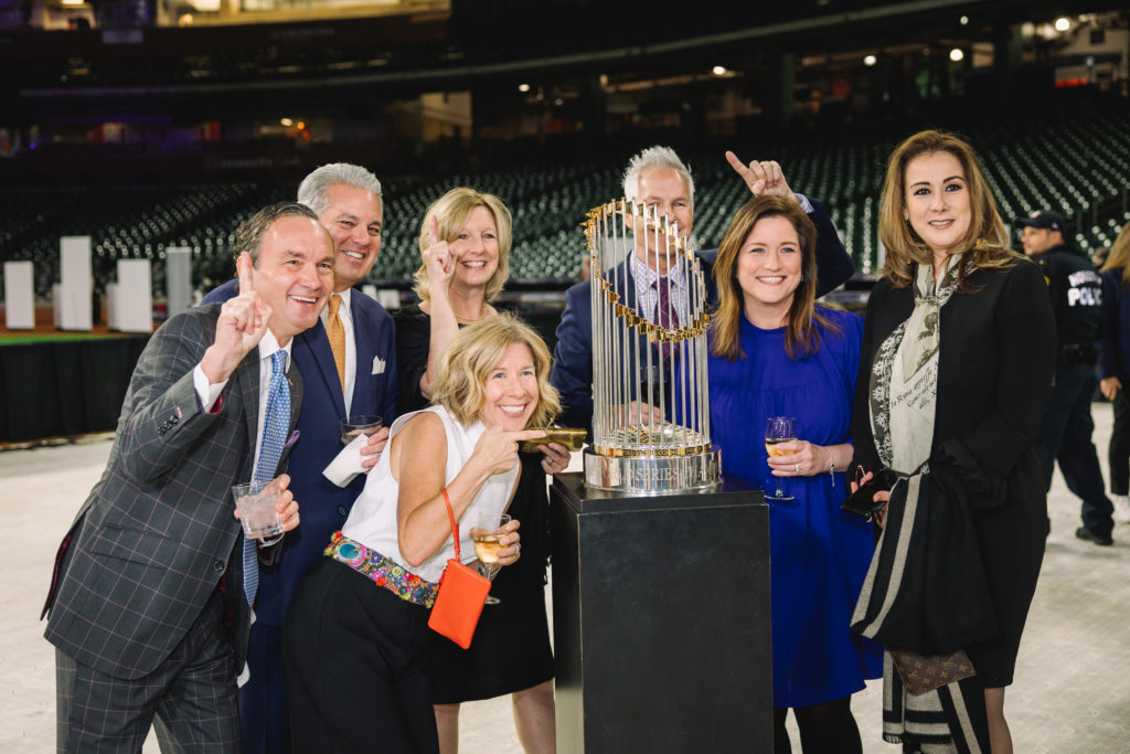 Photos with the Astros' 2022 World Series trophy was highlight of the evening for many Crime Stoppers supporters. (Photo by CatchlightGroup.com)