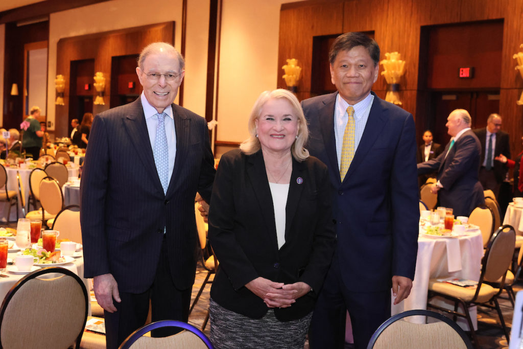 Charles Hurwitz, Congresswoman Sylvia Garcia, luncheon chair Frank Liu at Holocaust Museum Houston Guardian of the Human Spirit Award luncheon.