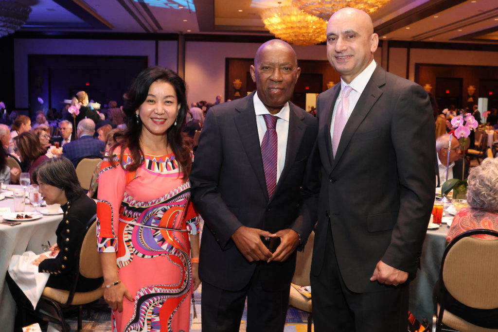 Luncheon chair Nancy Li-Tarim, Mayor Sylvester Turner, luncheon chair Dr. Soner Tarim at Holocaust Museum Houston Guardian of the Human Spirit Award luncheon.
