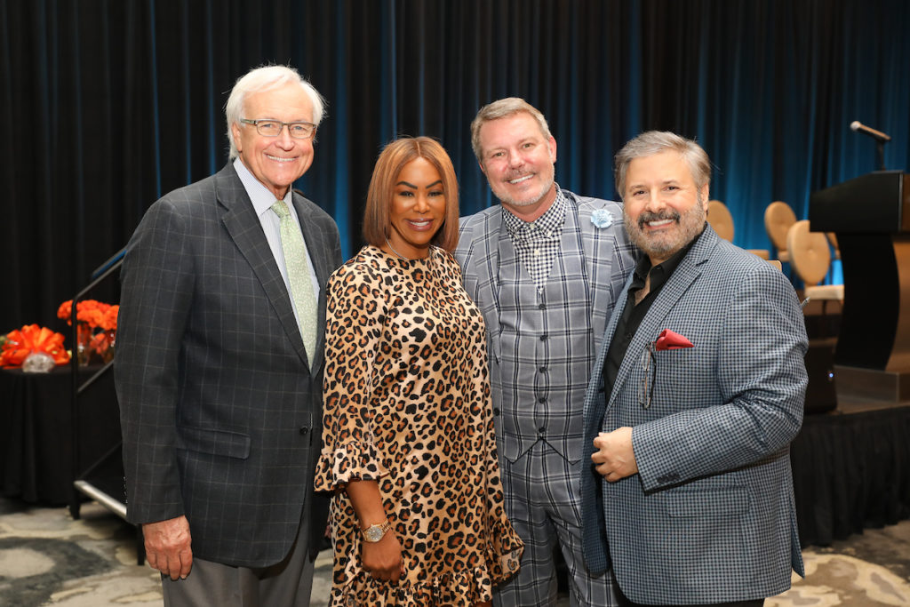 Auctioneer Bill King, emcee Deborah Duncan, event planner Paul-David Van Atta, emcee Ernie Manouse at the Women of Substance luncheon. (Photo by Priscilla Dickson)
