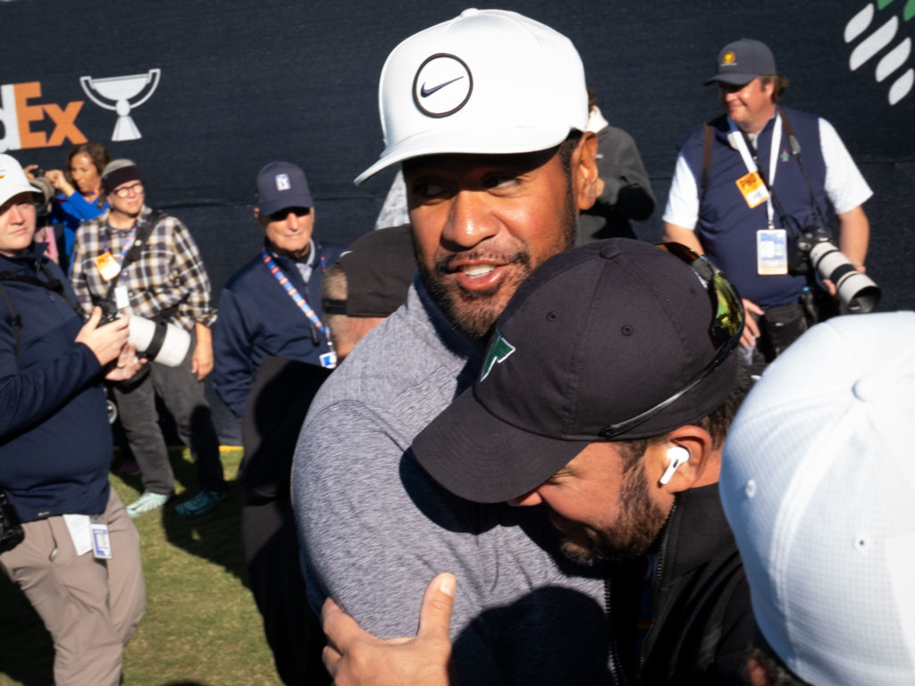 Tony Finau got plenty of hugs from friends and family after his Houston Open win. (Photo by F. Carter Smith)