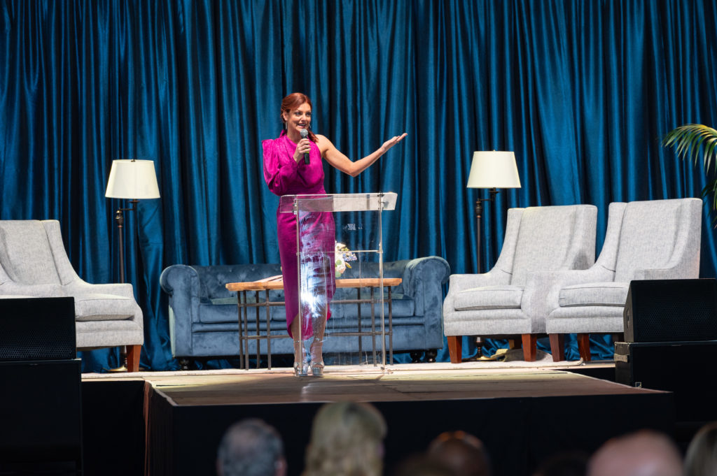 Emcee Julia Morales at the Crime Stoppers dinner on the field at Minute Maid Park. (Photo by CatchlightGroup.com)