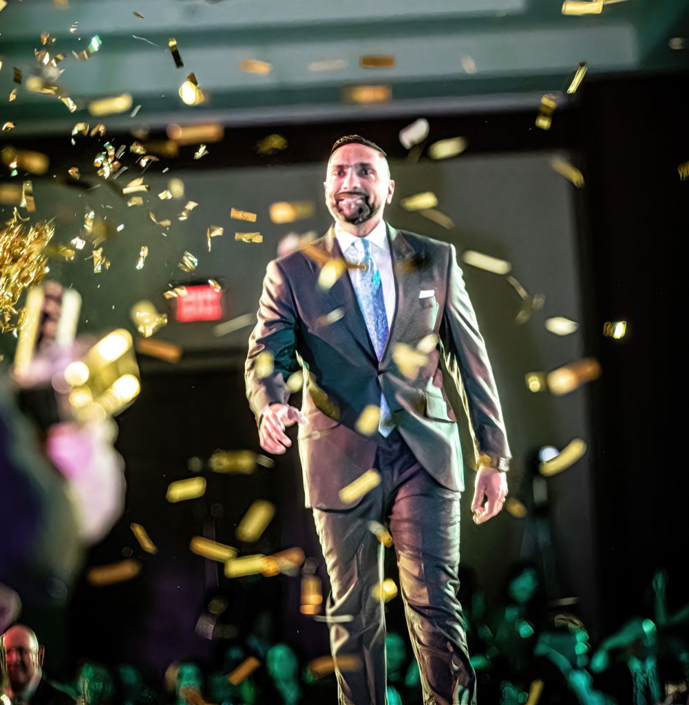 Attorney Mo Aziz on the catwalk at the Una Notte in Italia gala at the Omni Hotel. (Photo by Steven Taylor)