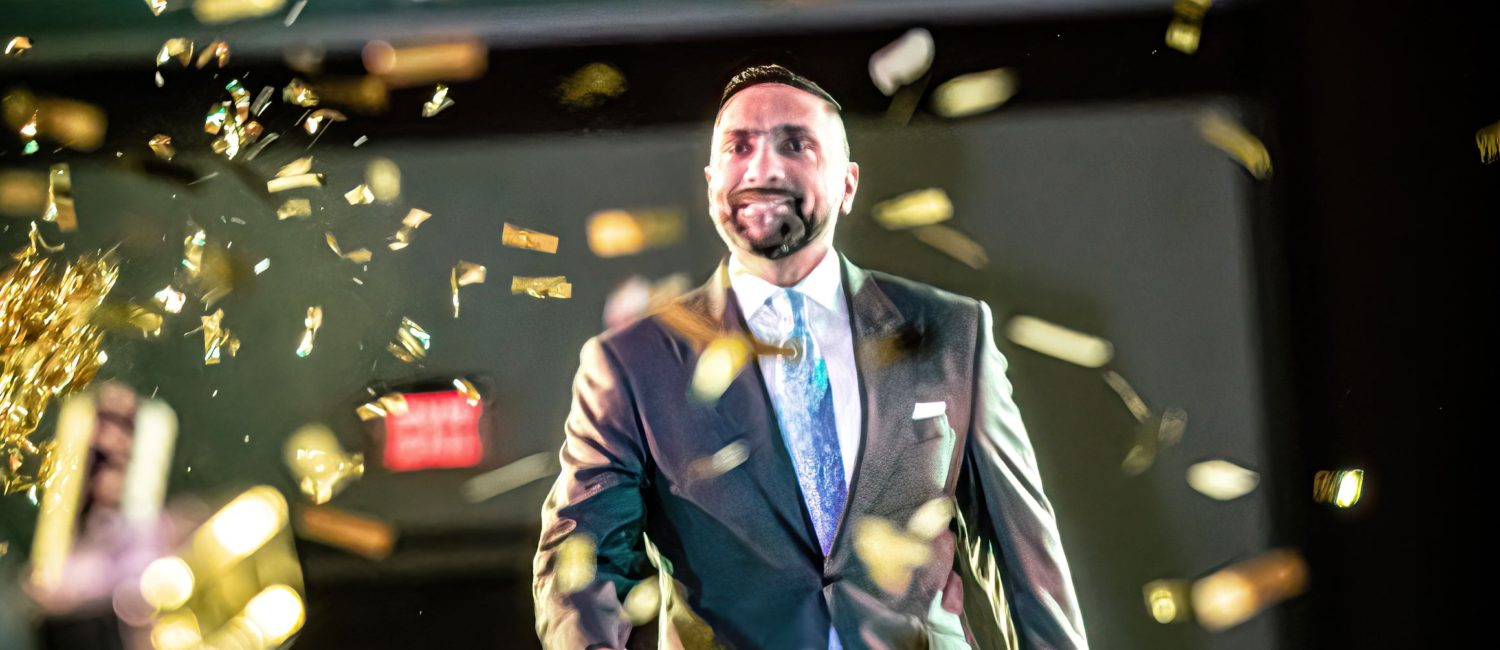 Attorney Mo Aziz on the catwalk at the Una Notte in Italia gala at the Omni Hotel. (Photo by Steven Taylor)