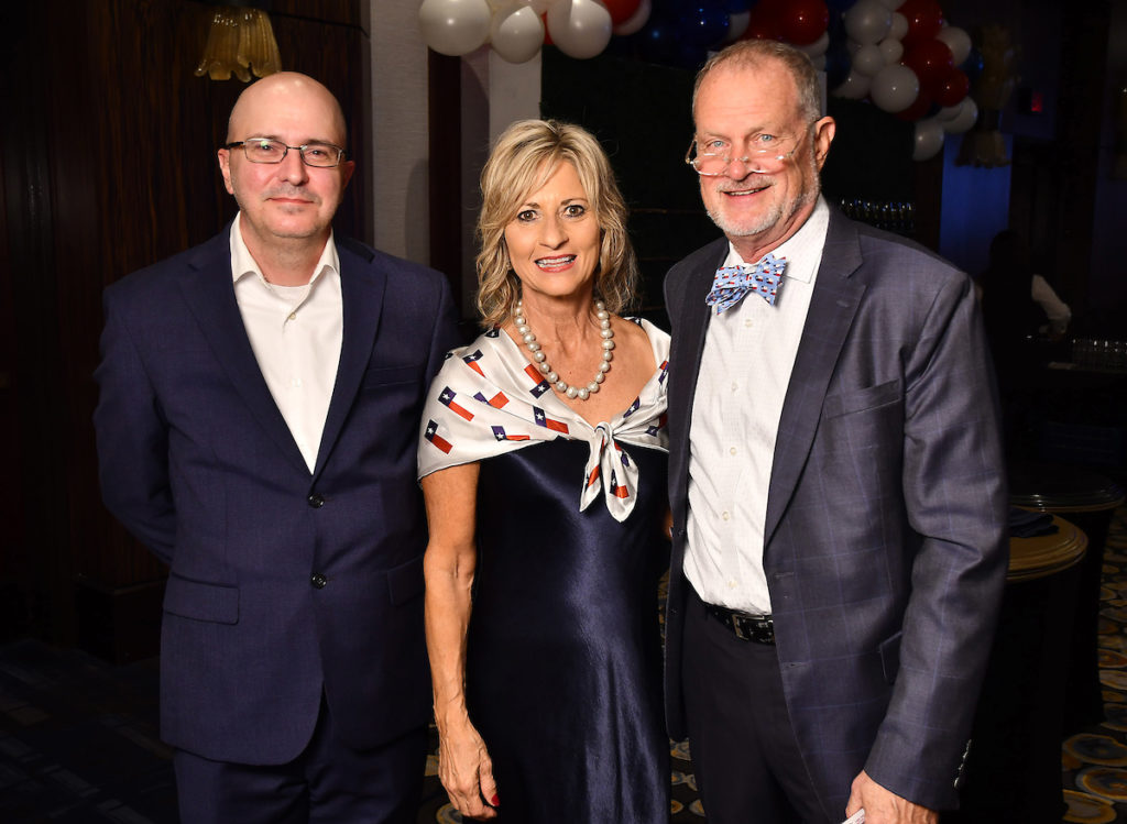 Eric Broussard, DLisa & John Johnston at the iWrite Gala at the Hilton Americas Houston Hotel. (Photo by Dave Rossman)